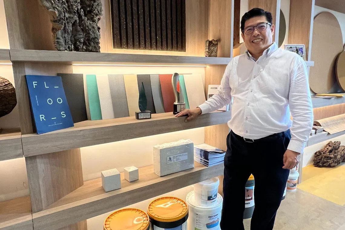 Buildo Engineering founder and managing director Mike Wong showcasing his cork construction products, which are greener than wood.