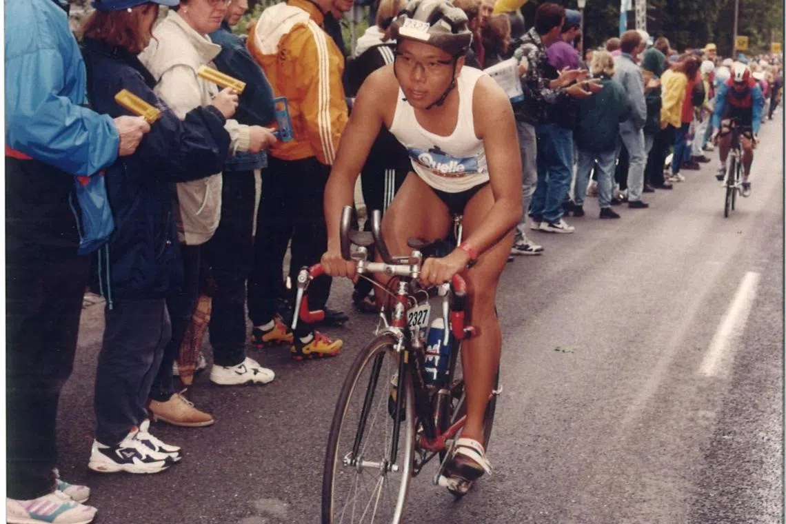 On the bike leg of the Roth Ironman race in Germany, 1997. The event covers a 3.8km swim, 180km cycling, and then a 42km run. 