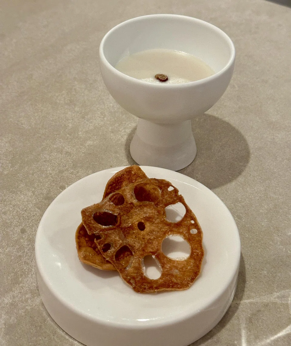 Creamy pine nut porridge and crunchy lotus root chips.