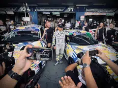 Morizo, the alter ego of Toyota president and chief executive Akio Toyoda, greets the crowd before the start of the Idemitsu 1500 at the Chang International Circuit in Buriram, Thailand.