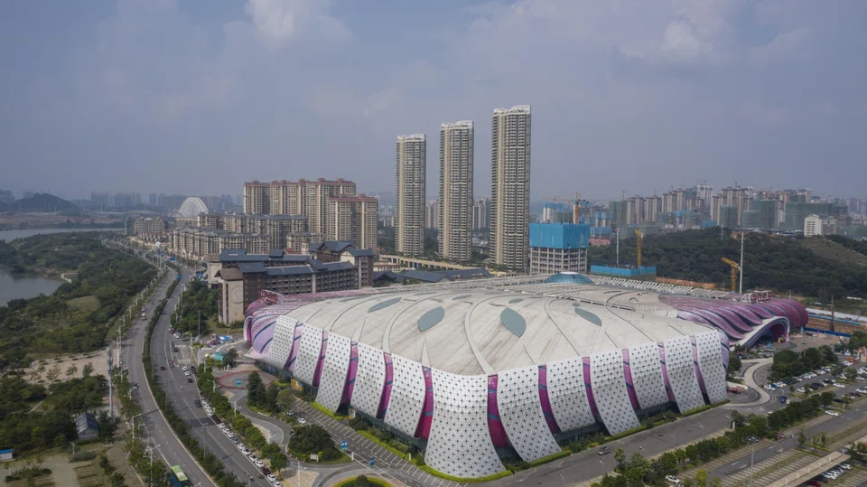 Dalian Wanda Group operates properties such as Wanda Mall (above) in Guangxi province, China. The group initially delayed its unit’s IPO a year ago because of market volatility.