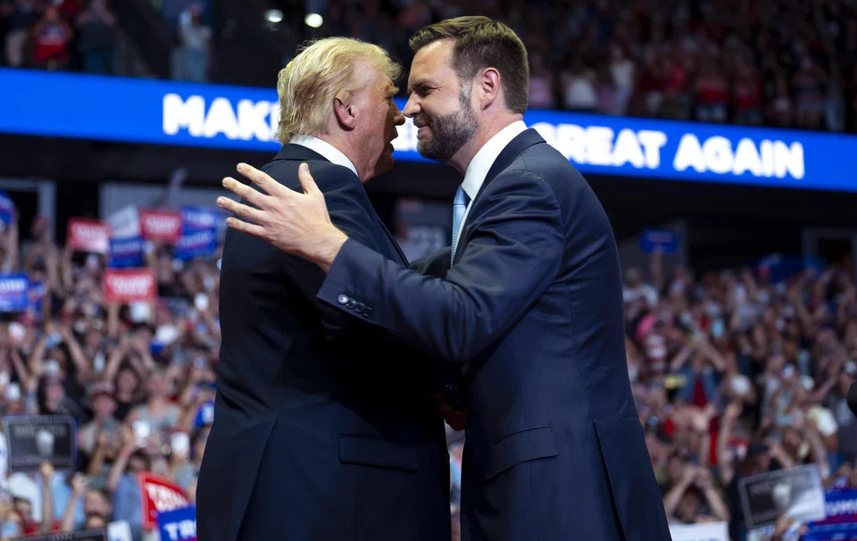 Former President Donald Trump and his vice-presidential pick, Senator JD Vance, at a joint campaign rally, in Grand Rapids, Michigan., on Jul 20, 2024. 