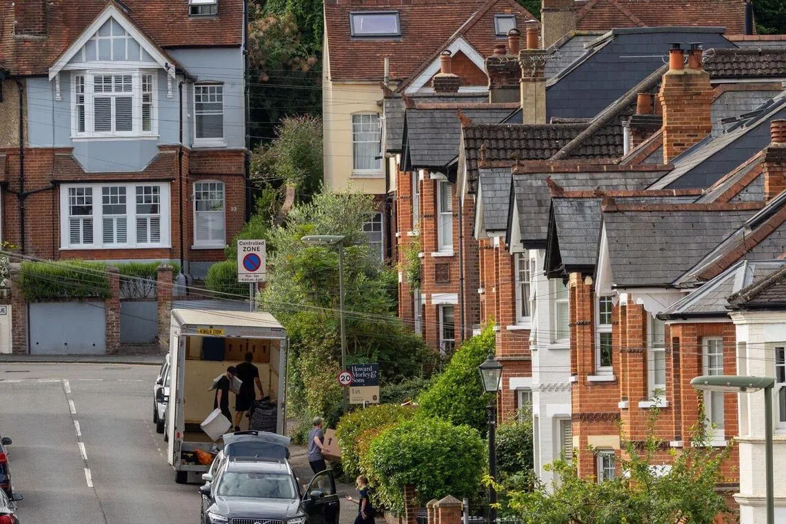 Above: Homes in Guildford, 44 km south-west of London. The average home value increased 0.3% to £272,998 in November, suggesting that the housing market is holding up.