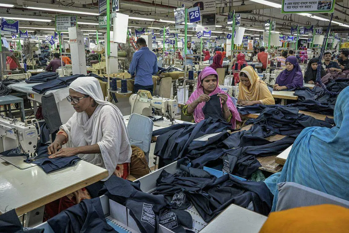 Workers at a garment factory in Dhaka, Bangladesh. The country, which built its success on turning farmers into textile workers, is facing challenges with automation.