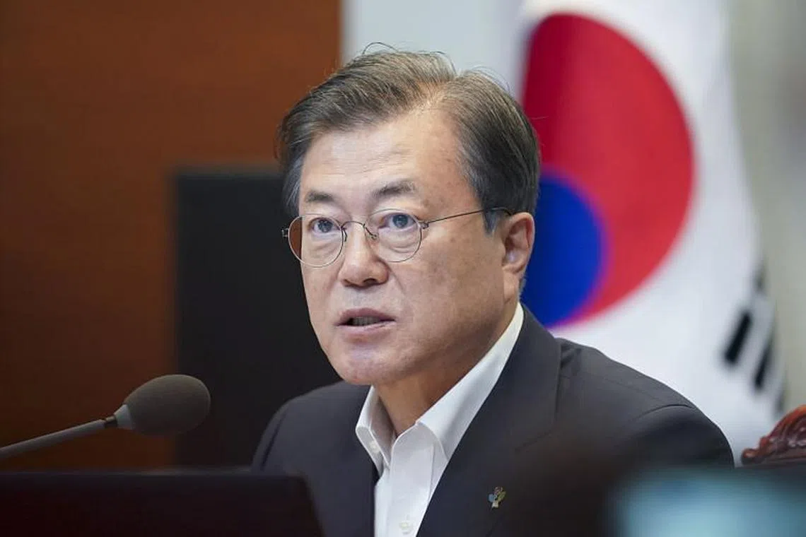 South Korea's Moon shuffles top aides in bid to revive North Korea talks