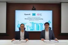 OpenAI managing director of international strategy Oliver Jay (left) and STB chief technology officer Jordan Tan at the signing of the MOU.