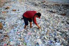 A beach in Bali with plastic and other debris washed ashore. This week, some 160 governments are meeting in Ottawa, Canada, with a revised draft of global rules on plastic pollution.