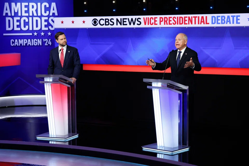 Republican vice-presidential candidate JD Vance (left) and Democratic candidate Tim Walz at the debate at the CBS Broadcast Center in New York, on Oct 1. 