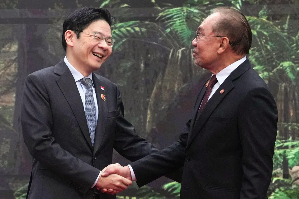 Singapore Prime Minister Lawrence Wong (left) has commended his Malaysian counterpart Anwar Ibrahim for steering Asean through “a very eventful year” as the bloc’s chair this year.