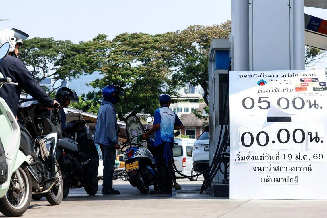 Above: A petrol station in Bangkok. Import-dependent economies such as Thailand and the Philippines have had to take drastic measures, such as subsidy cuts and export bans, to prevent a crisis.