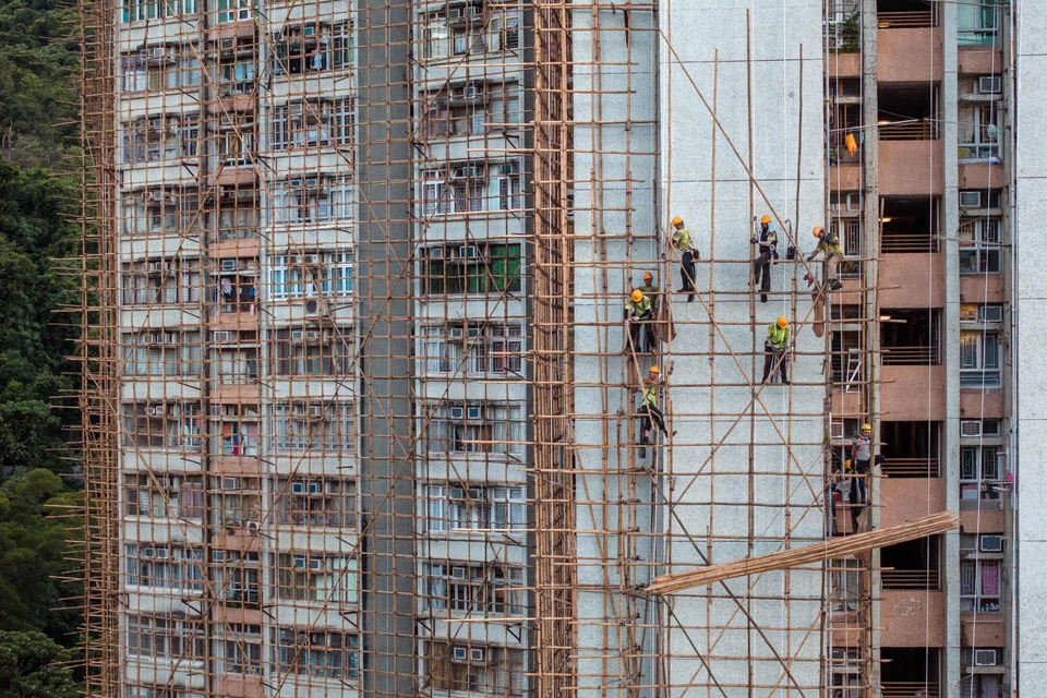 Bamboo scaffolding can be cut to fit irregular spaces, a useful characteristic in a densely populated city where buildings are inches away from each other.