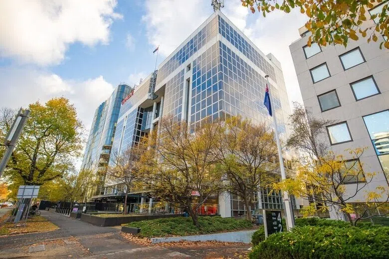 The freehold office building in Melbourne's St Kilda Road has been sold to retail billionaire Solomon Lew.