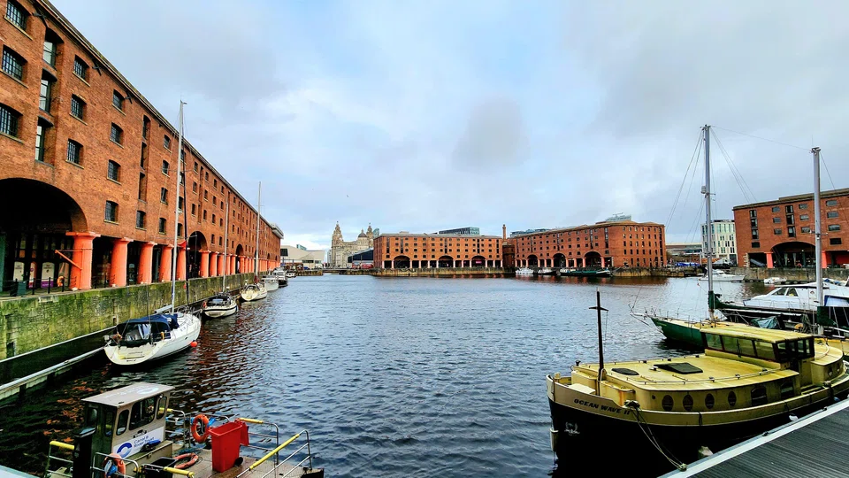 The city's revitalised docklands, with the Tate Liverpool gallery at left.  The building is slated for renovation later in 2023.