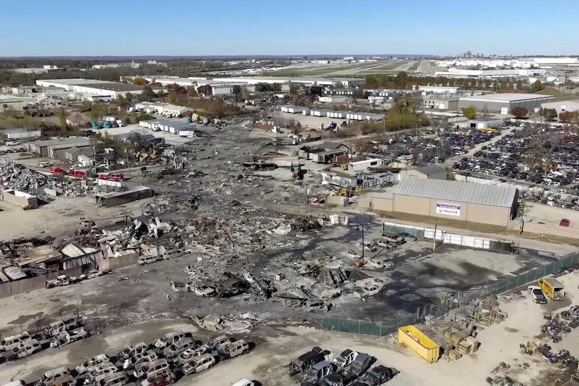 A drone view of the crash site next to a runway at the Muhammad Ali International Airport following the crash of a UPS cargo plane in Louisville, Kentucky, Nov 7, 2025.    