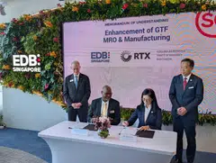 Pratt & Whitney's senior vice-president of commercial engines operations Robert Griffiths (left, seated) and executive vice-president of EDB Cindy Koh at the MOU signing ceremony at Singapore Airshow 2026.