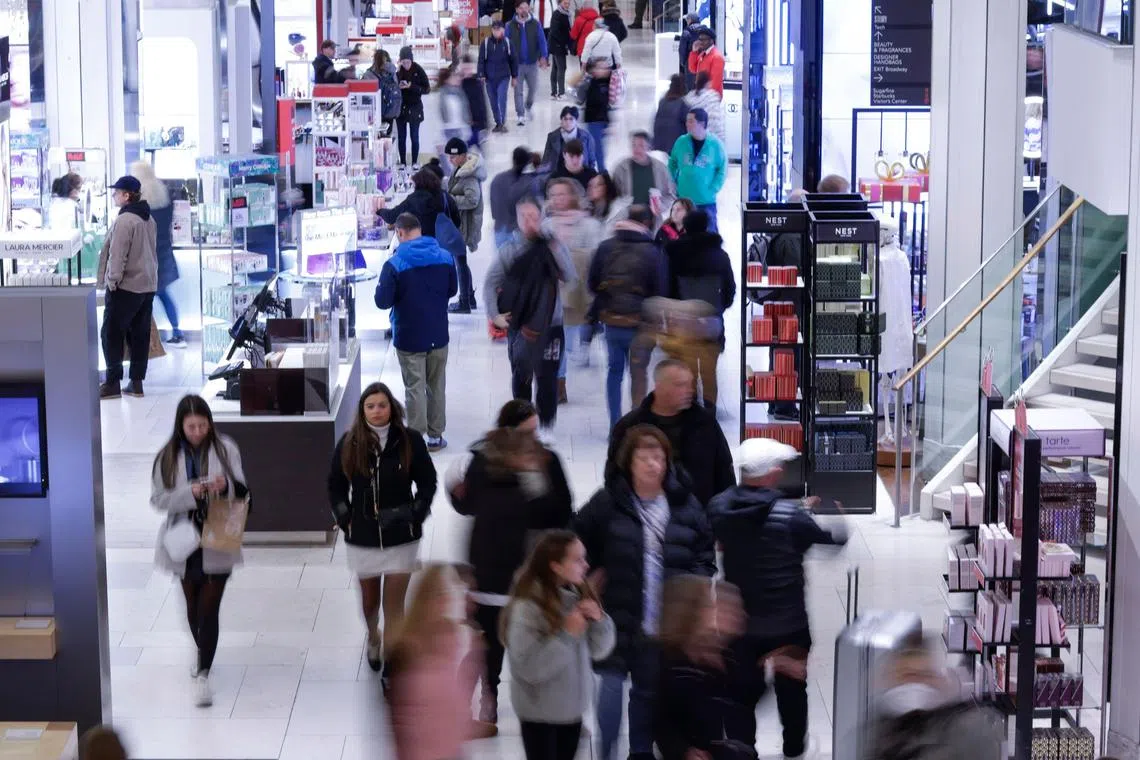 NEW YORK, NEW YORK - NOVEMBER 24: A Costumer visits the store on early morning Black Friday Sales at Macy's herald square on November 24, 2023 in New York City. The National Retail Federation projects that an estimated 182 million are planning to shop in-store and online through the five-day Thanksgiving weekend.   Kena Betancur/Getty Images/AFP (Photo by KENA BETANCUR / GETTY IMAGES NORTH AMERICA / Getty Images via AFP)