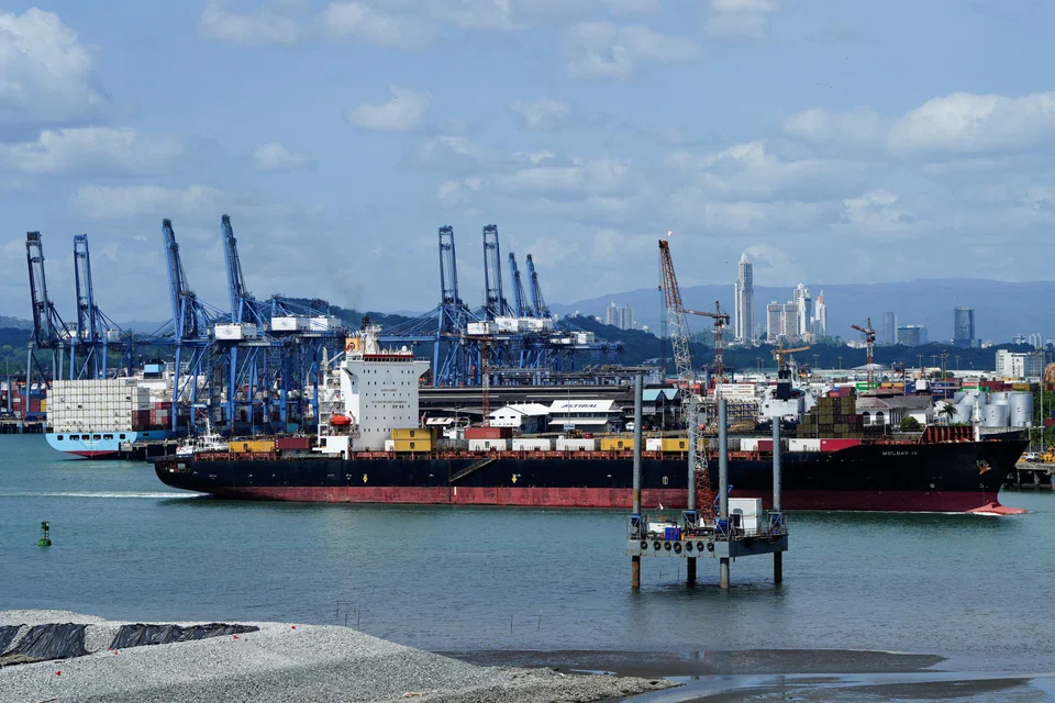 A ship sails near the Balboa Port after Hong Kong's CK Hutchison agreed to sell its interests in a key Panama Canal port operator to a BlackRock-backed consortium, amid pressure from US President Donald Trump to curb China's influence in the region, Panama City, Panama, March 4, 2025. 
