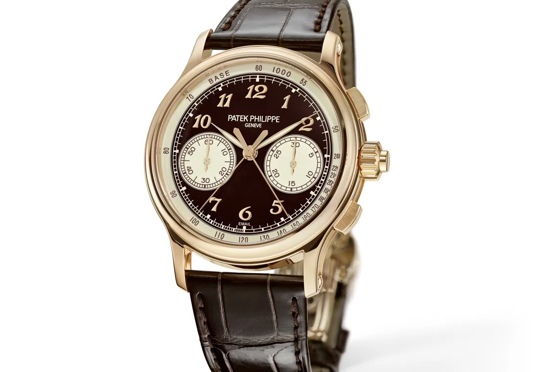 The Ref 5370R-001 rose gold split-seconds chronograph features a brown Grand Feu enamel dial with beige champlevé enamel subdials and tachymeter scale. 