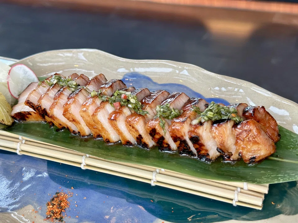 Grilled kurobuta pork belly has a char siew-like flavour and juiciness.