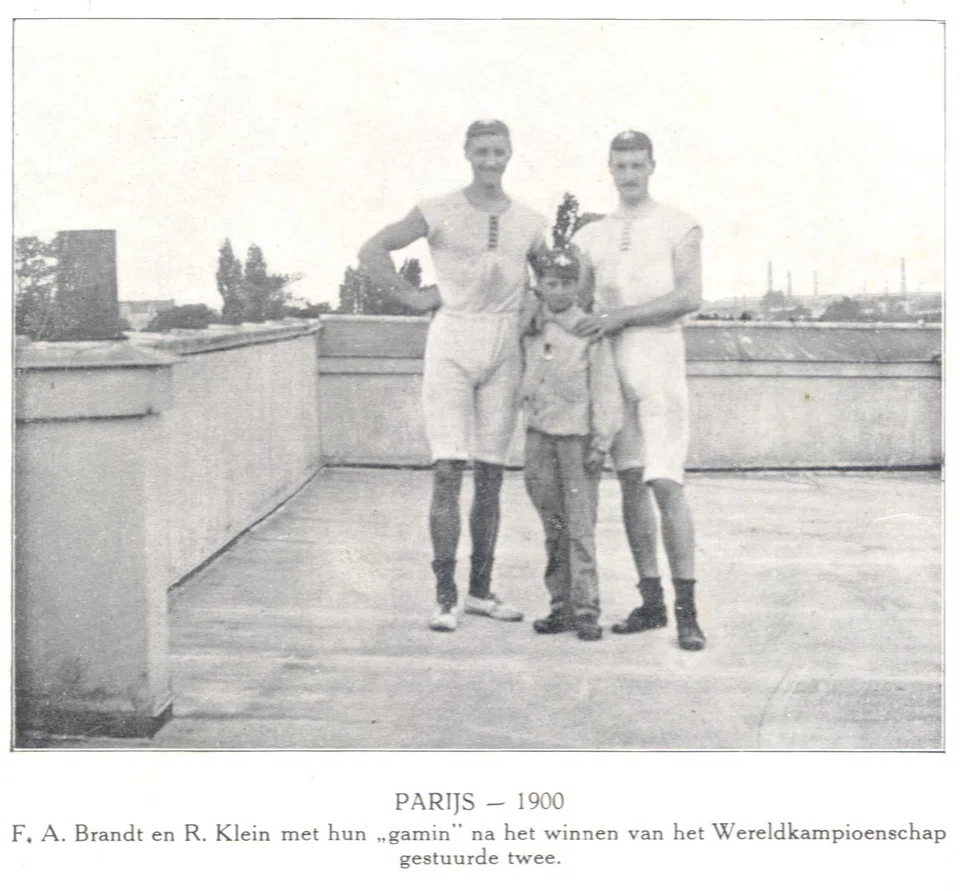 An undated photograph from 1900, showing Dutch rowers Francois Antoine Brandt and Roelof Klein as they pose with their "unknown" coxswain after he steered them to victory in the coxed pairs rowing event of the 1900 Paris Olympics in Paris. 