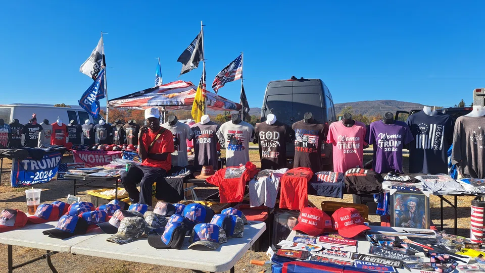 More than a dozen stalls selling Trump merchandise were set up in the field beside the civic centre. Water was being sold at a small bottle for US$3 and two for US$5.