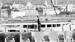 A worker standing at a construction site in Vienna. There is no denying that lists of the top global technology companies, the world’s top universities, or semiconductor manufacturing capacity, tend to show Europe falling behind.