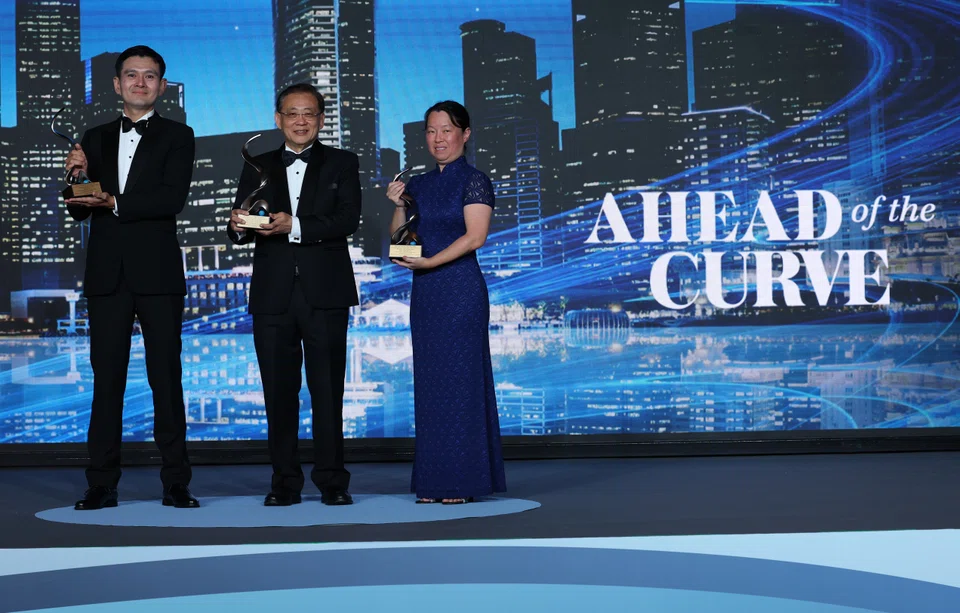 Recipients of the Best Chief Executive award at the 18th Singapore Corporate Awards. From left: Seah Kiin Peng, CEO of BRC Asia; Jeffery Tan, group general counsel of Jardine Cycle & Carriage, representing CEO Benjamin Birks; and Jeanette Chang, CEO of Baker Technology. 