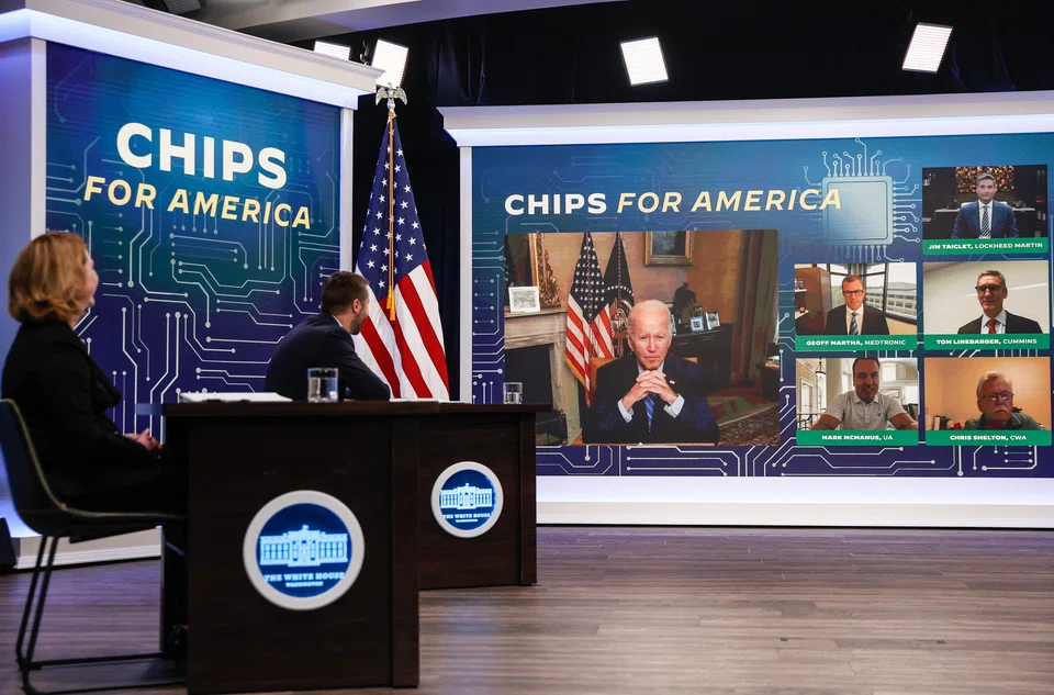 US President Joe Biden said government backing for domestic semiconductor producers means the United States will “be able to stay in the game.”