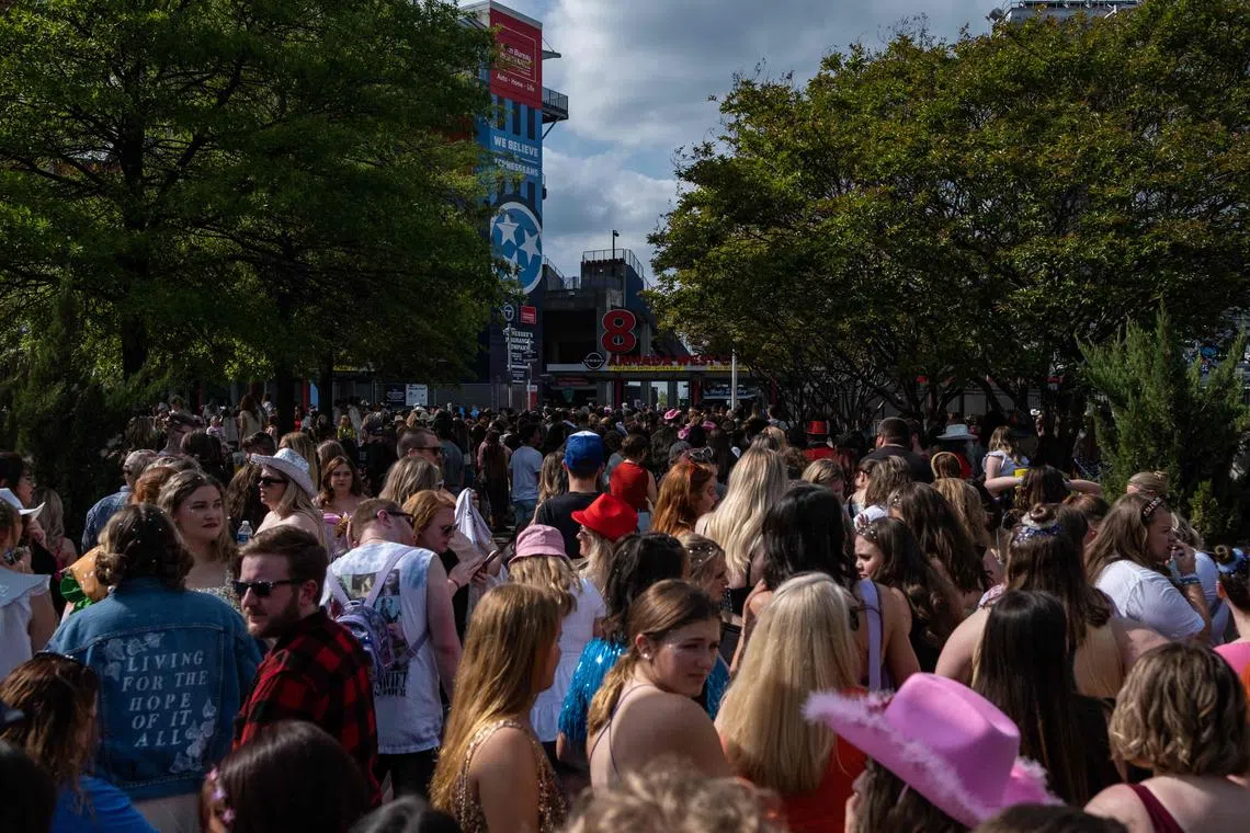 Fans wait in line outside Nissan Stadium ahead of artiste Taylor Swift's second night of performance on May 6, 2023 in Nashville, Tennessee. 