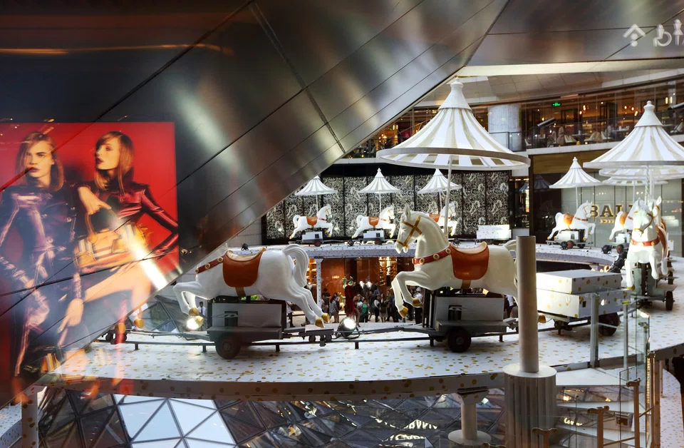 A merry-go-round is seen at New World Development's K11Art Mall. Adrian Cheng, 45, abruptly stepped aside as chief executive officer of the company last year. 