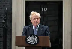 Britain's Prime Minister Boris Johnson makes a statement in front of 10 Downing Street in central London on July 7, 2022. - Johnson quit as Conservative party leader, after three tumultuous years in charge marked by Brexit, Covid and mounting scandals. (Photo by JUSTIN TALLIS / AFP)