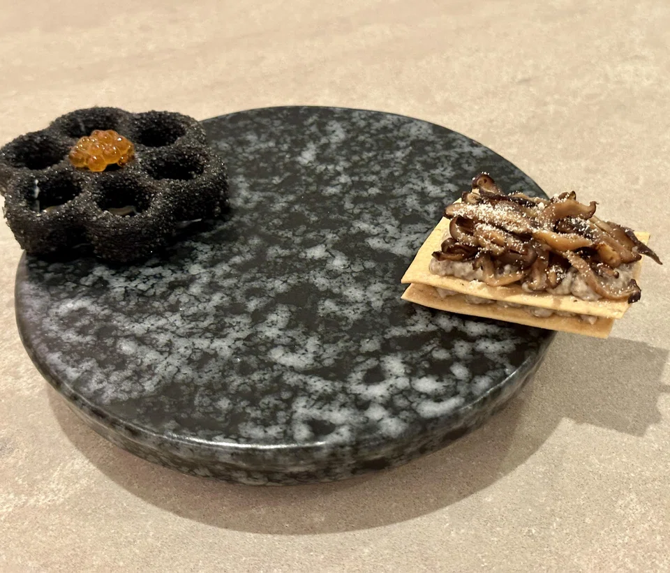 Tasty shiitake mushroom crackers and squid ink cracker filled with savoury fish cream.