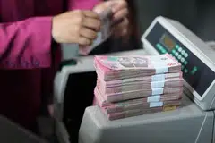 The rupiah rose as much as 0.6% against the US dollar.