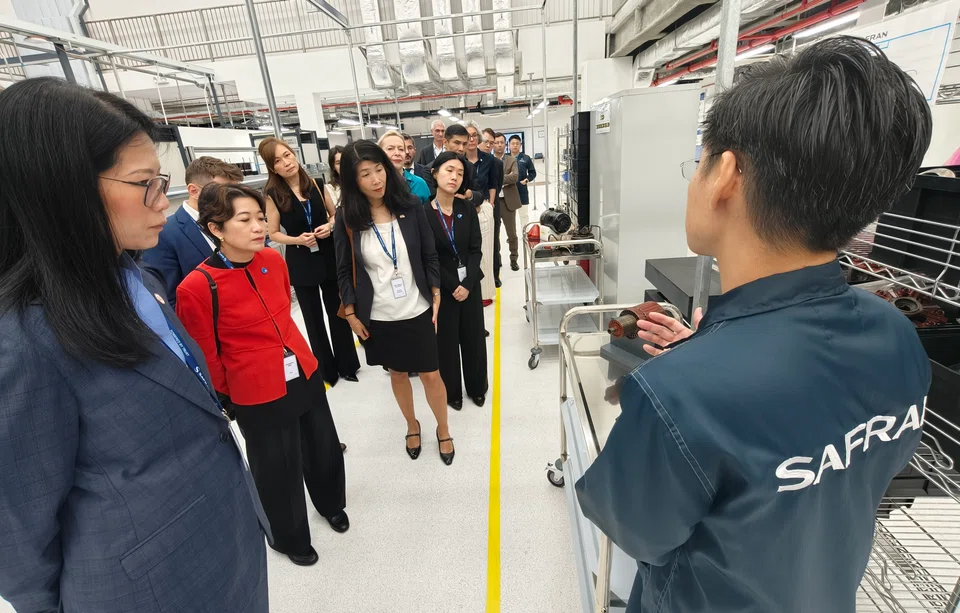 Inside Safran Electric & Power's new Singapore site. From left (front): Cindy Koh, executive vice-president, Singapore Economic Development Board; Jacqueline Poh, CEO, JTC Corporation; Adeline-Lise Khov, head of the Regional Economic Service for Asean at French Embassy in Singapore. 