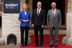 Britain's Prime Minister Keir Starmer (centre) is flanked by European Commission President Ursula von der Leyen (left) and European Council President Antonio Costa (right) as they arrive to attend the UK-EU Summit at Lancaster House in London on May 19.
