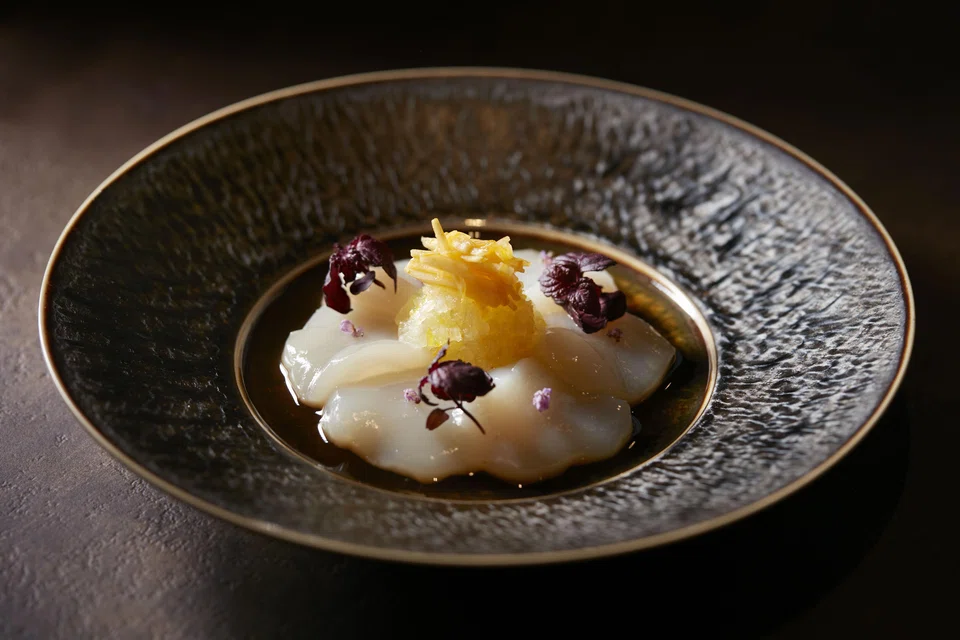 Scallop ceviche with a spicy mango salsa.