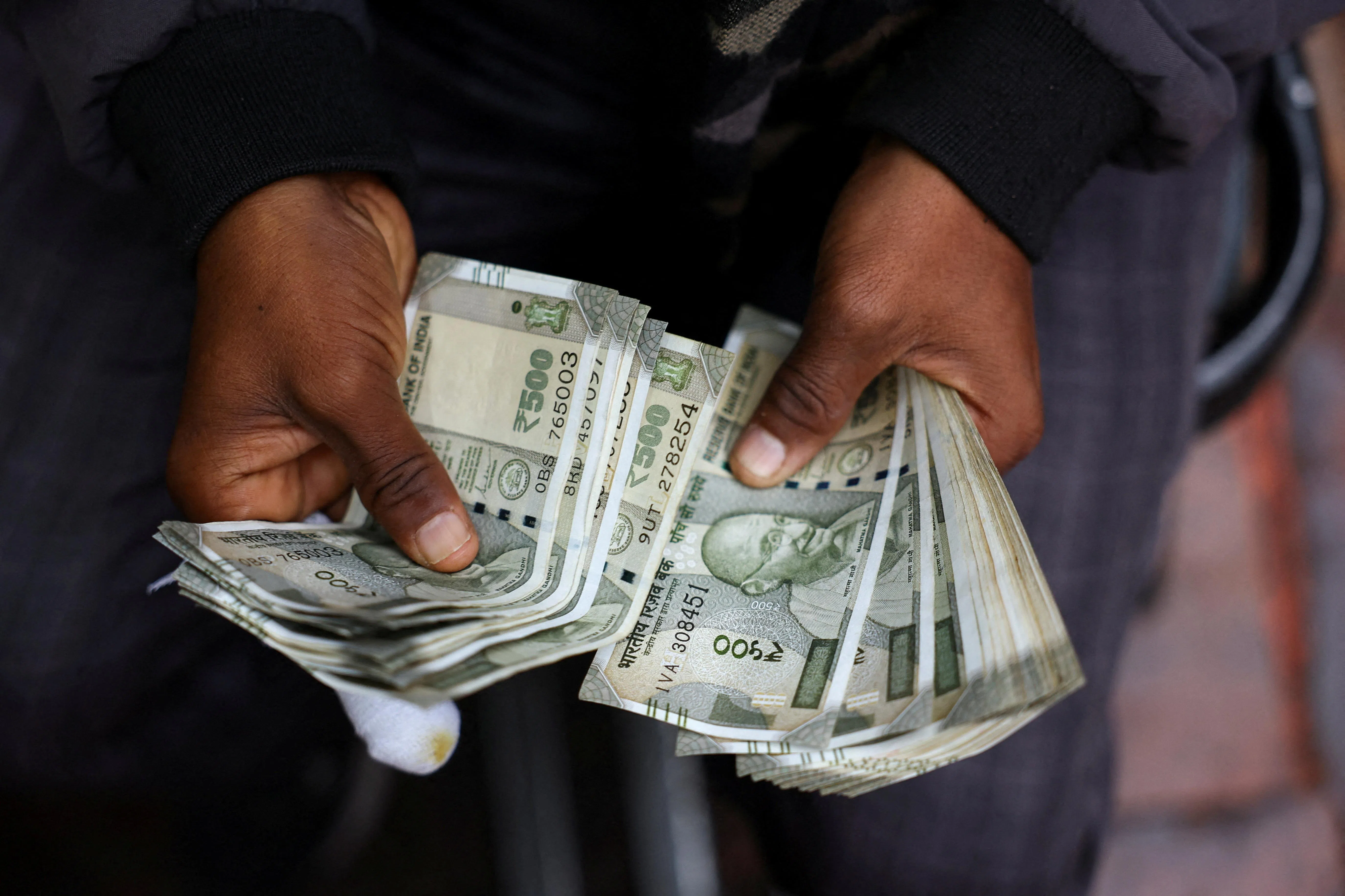 Rupee extends rally as RBI intervention, oil slump trigger stop losses