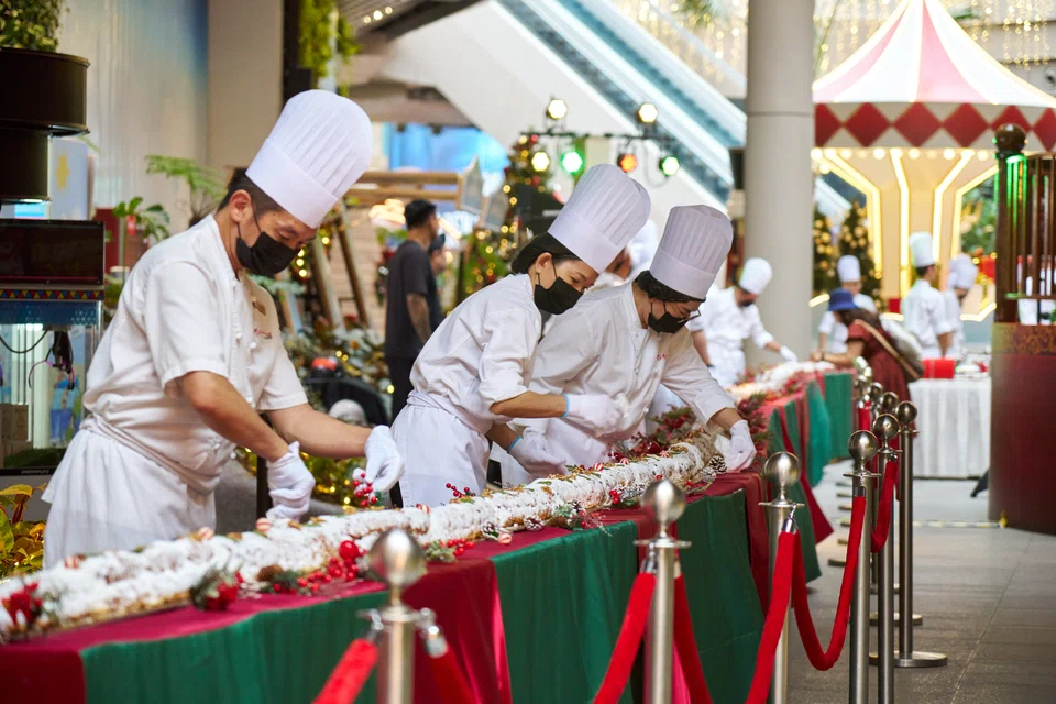 Chefs setting up the 93.1-m-long stollen on Wednesday.