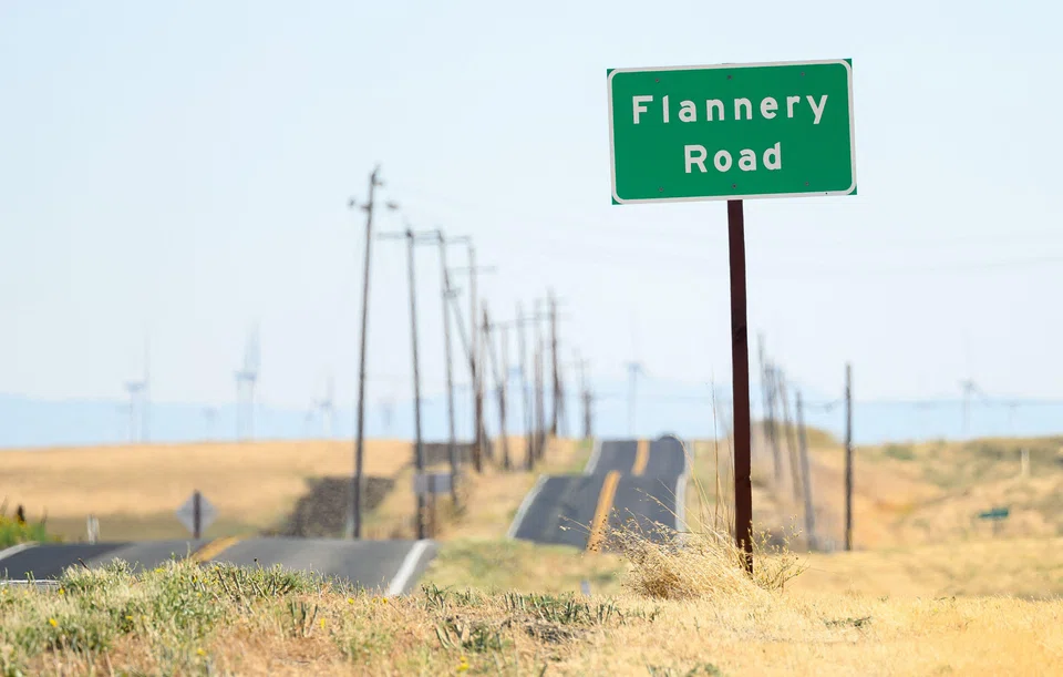 A road sign is seen near a parcel of land recently purchased by Flannery Associates near Rio Vista, California. 