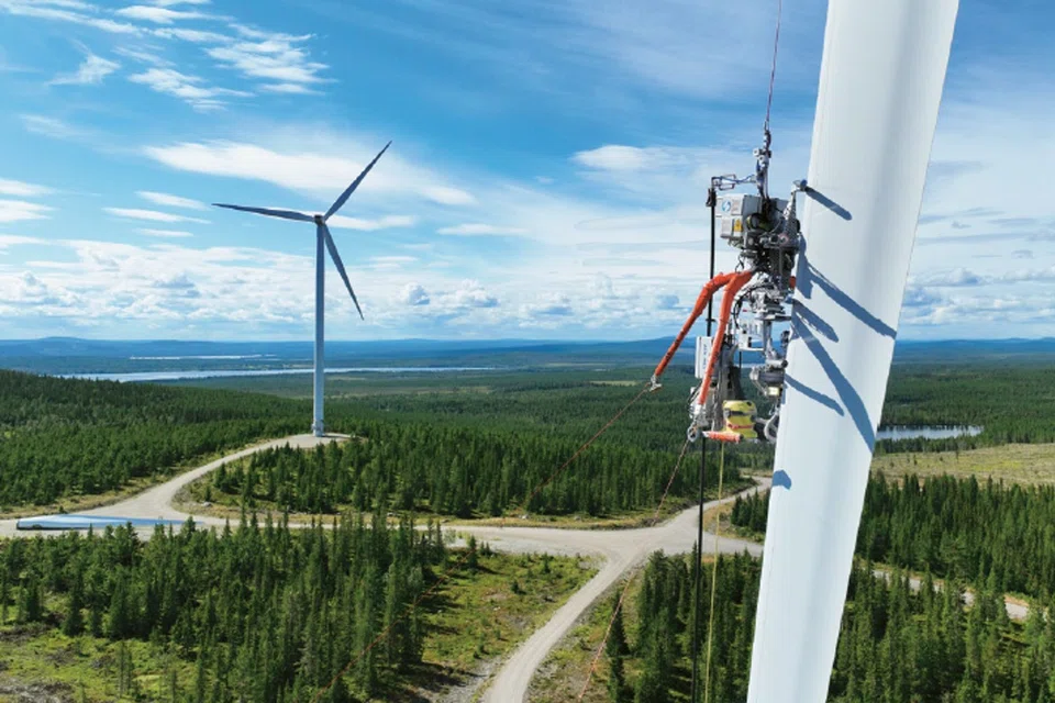 LGT, through its impact investing platform Lightrock, supports companies advancing renewable energy solutions. In the foreground, an Aerones robot – one of Lightrock's investments – helps to maintain and inspect wind turbines.