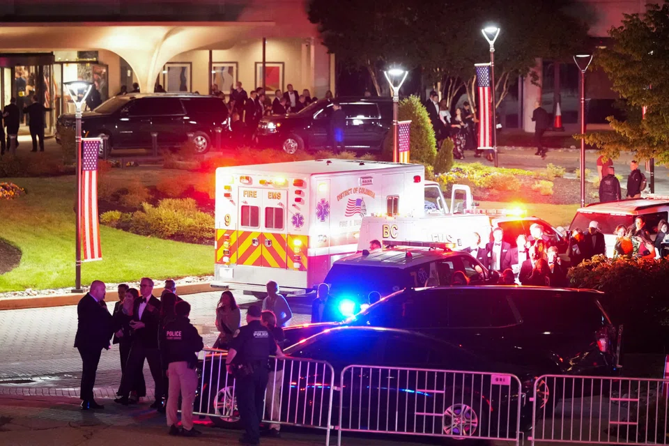 Attendees leave the venue following a shooting incident during the annual White House Correspondents' Association dinner in Washington on Apr 25.