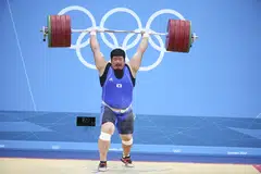 Weightlifter Jeon Sang-guen at the 2012 London Olympics. After his bitter fourth-place finish then, Jeon returned home and started a new life.