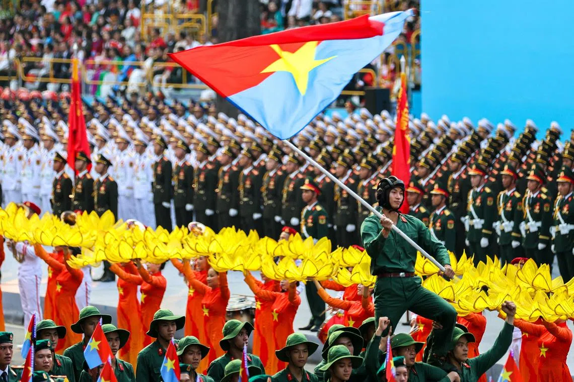 Vietnamese troop march during a parade to commemorate the 50th anniversary of the fall of Saigon, in Ho Chi Minh city, Vietnam, April 30, 2025. REUTERS/Minh Nguyen     TPX IMAGES OF THE DAY