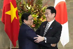 Vietnam's Prime Minister Pham Minh Chinh (left) met with Japanese Prime Minister Fumio Kishida in Tokyo. Vietnam is hopeful that Japan will provide loans for its infrastructure projects.