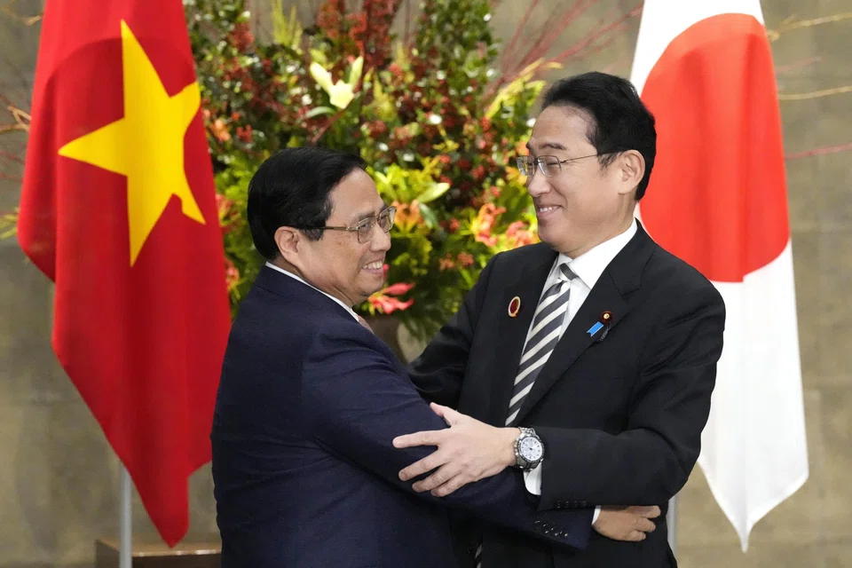 Vietnam's Prime Minister Pham Minh Chinh (left) met with Japanese Prime Minister Fumio Kishida in Tokyo. Vietnam is hopeful that Japan will provide loans for its infrastructure projects.