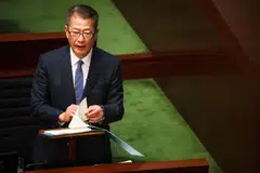 Paul Chan, Hong Kong's financial secretary, delivering his Budget speech at the city's Legislative Council. He  emphasised the government would strive to maintain fiscal balance by “strictly containing” expenditure. 
