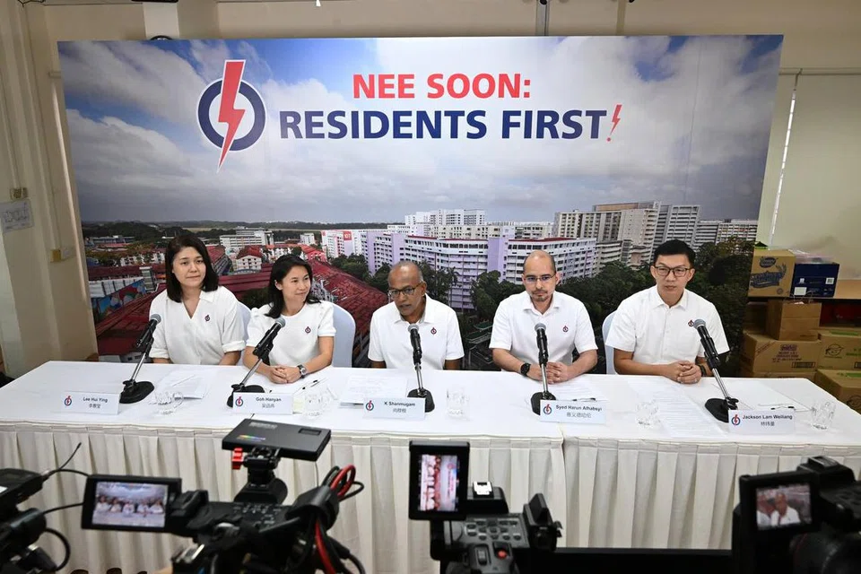 Law and Home Affairs Minister K Shanmugam (centre) with (from left) Lee Hui Ying, Goh Hanyan, Syed Harun Alhabsyi and Jackson Lam at PAP Chong Pang Branch on Apr 21.