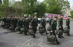 Russian conscripts called up for military service depart for garrisons from a recruitment centre in Bataysk, Rostov region, Russia, May 16, 2024. Government spending has outran revenue by tens of billions of dollars since Moscow ordered troops into Ukraine in February 2022, pushing the country into rare annual budget deficits.