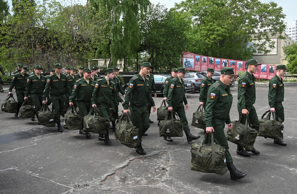 Russian conscripts called up for military service depart for garrisons from a recruitment centre in Bataysk, Rostov region, Russia, May 16, 2024. Government spending has outran revenue by tens of billions of dollars since Moscow ordered troops into Ukraine in February 2022, pushing the country into rare annual budget deficits.