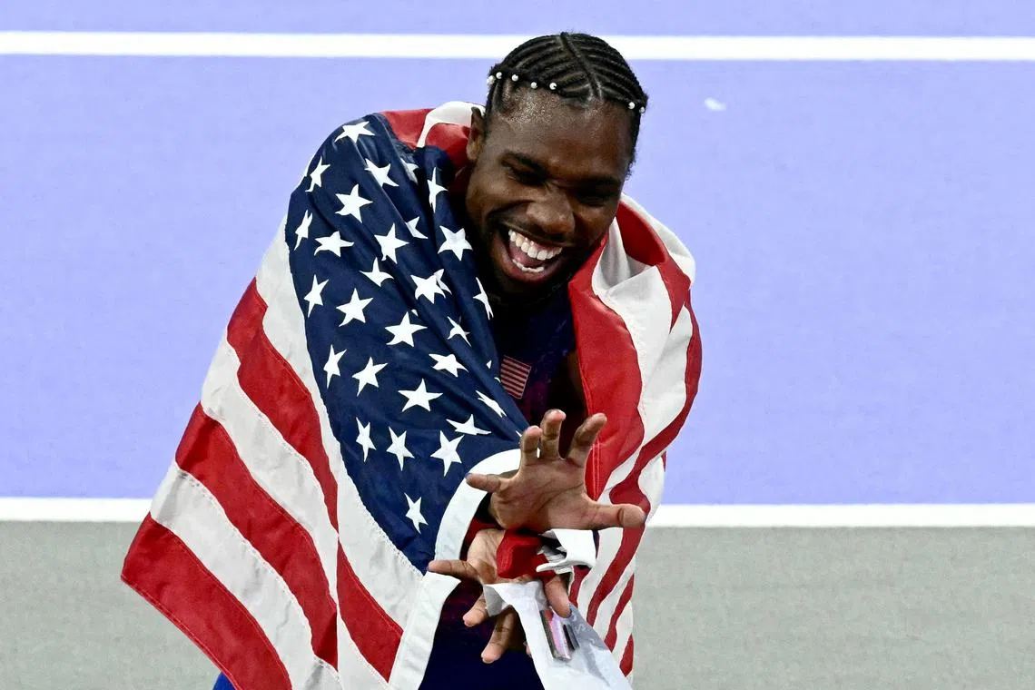 Wrapped in a US flag after the race, Olympic 100m gold medallist Noah Lyles thrust his hands forward, fingers splayed, imitating the “kamehamaha” attack used to unleash a powerful burst of energy in the Japanese manga and anime franchise.